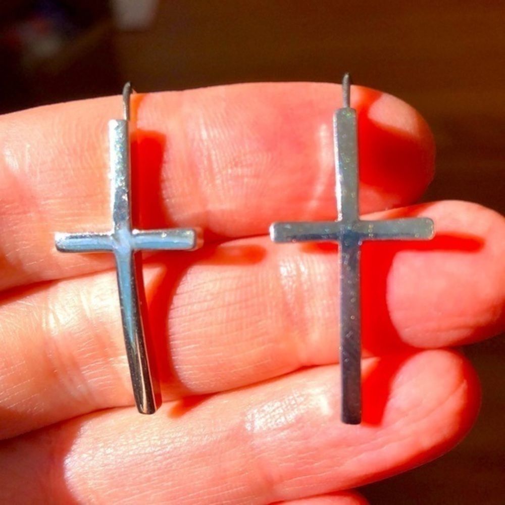 Silver toned cross earrings
